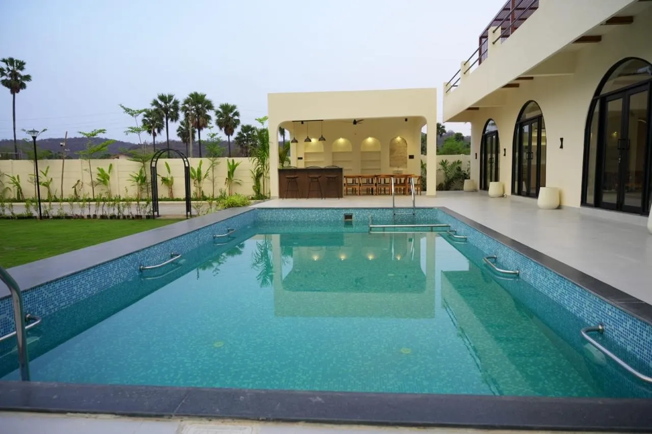 Private swimming pool at Bali villa farm house, Pedda Amberpet